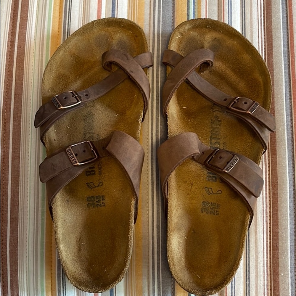 Birkenstocks; dark brown leather; gently worn